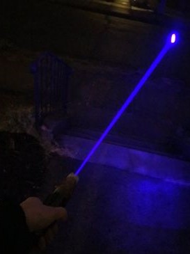 The beam of the lightsaber at night.