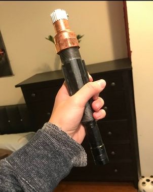 The handle of the lightsaber.