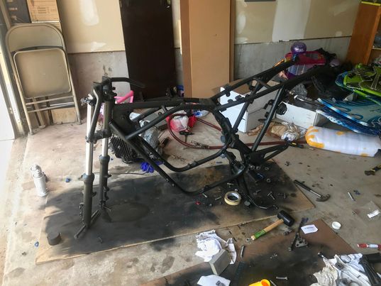 Repainting the motorcycle.