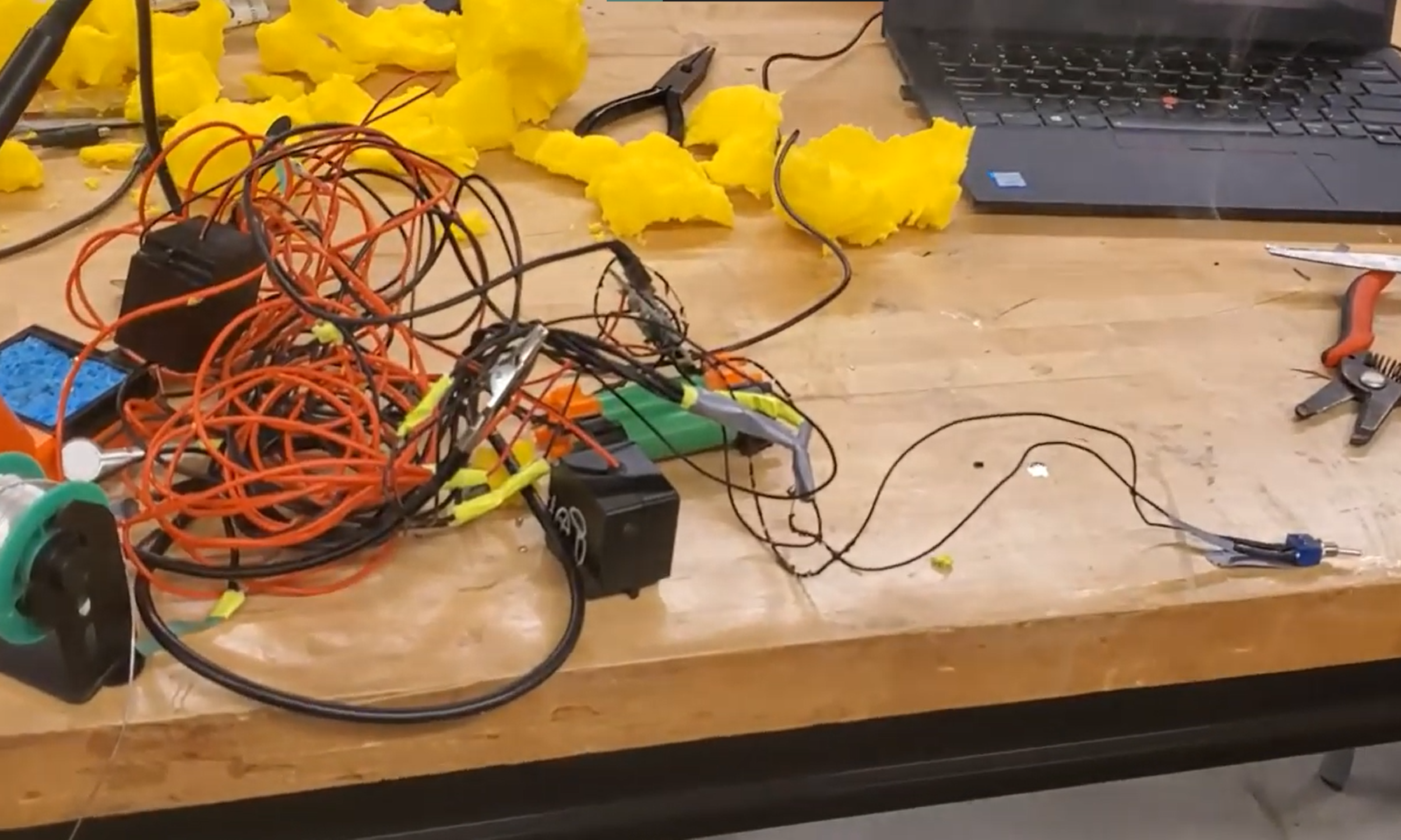 A jumble of wires and electronics that was our device.